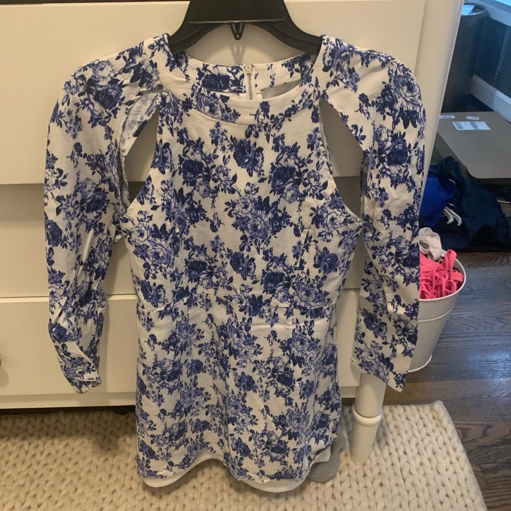 Such a fun & unique dress that can be worn for all occasions!
